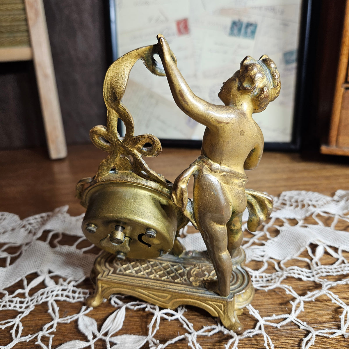 New Haven Cherub Figural Mantel Clock