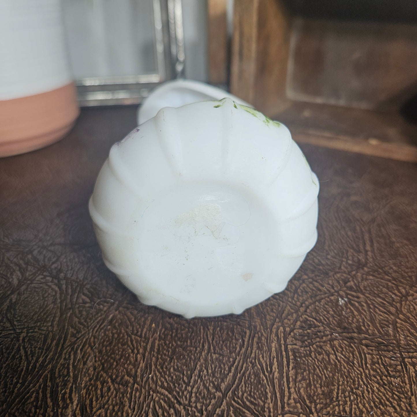 bottom of a hand painted small vase