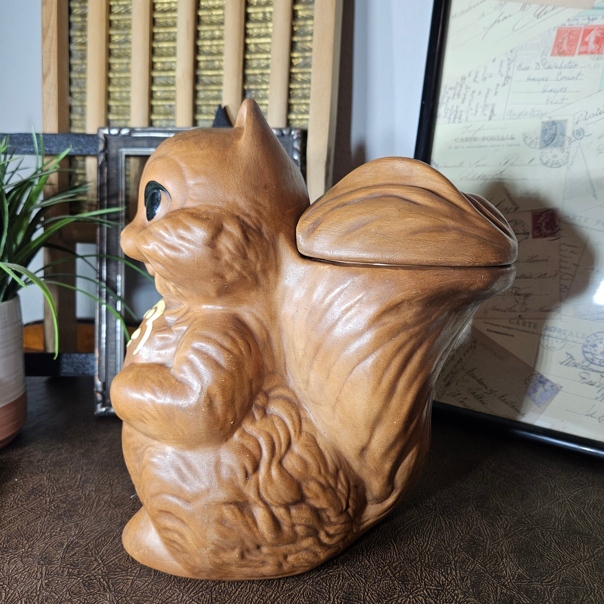 Ceramic squirrel figurine cookie jar 