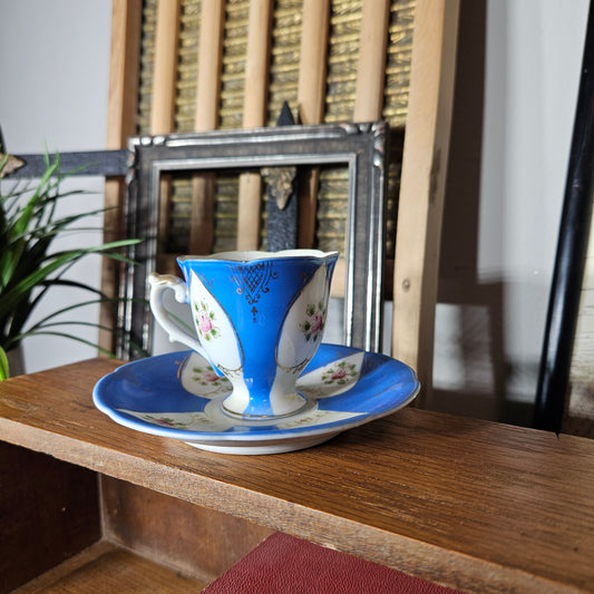 Blue and white ceramic dish with floral patterns on a wooden surface.