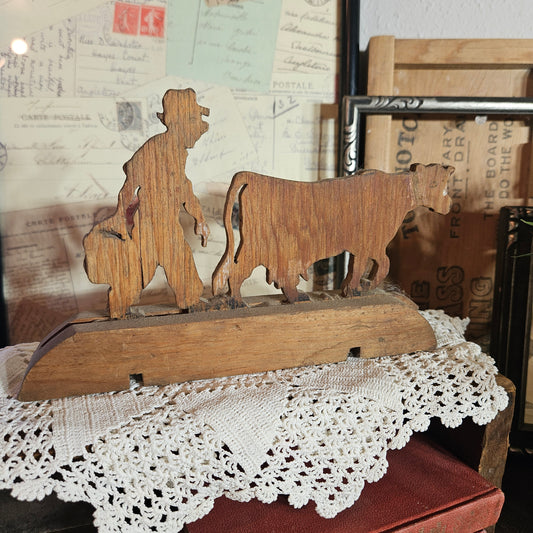 Hand Carved Wooden Farmer and Cow Folk Art Sculpture