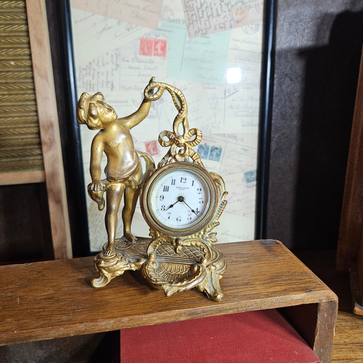 New Haven Cherub Figural Mantel Clock