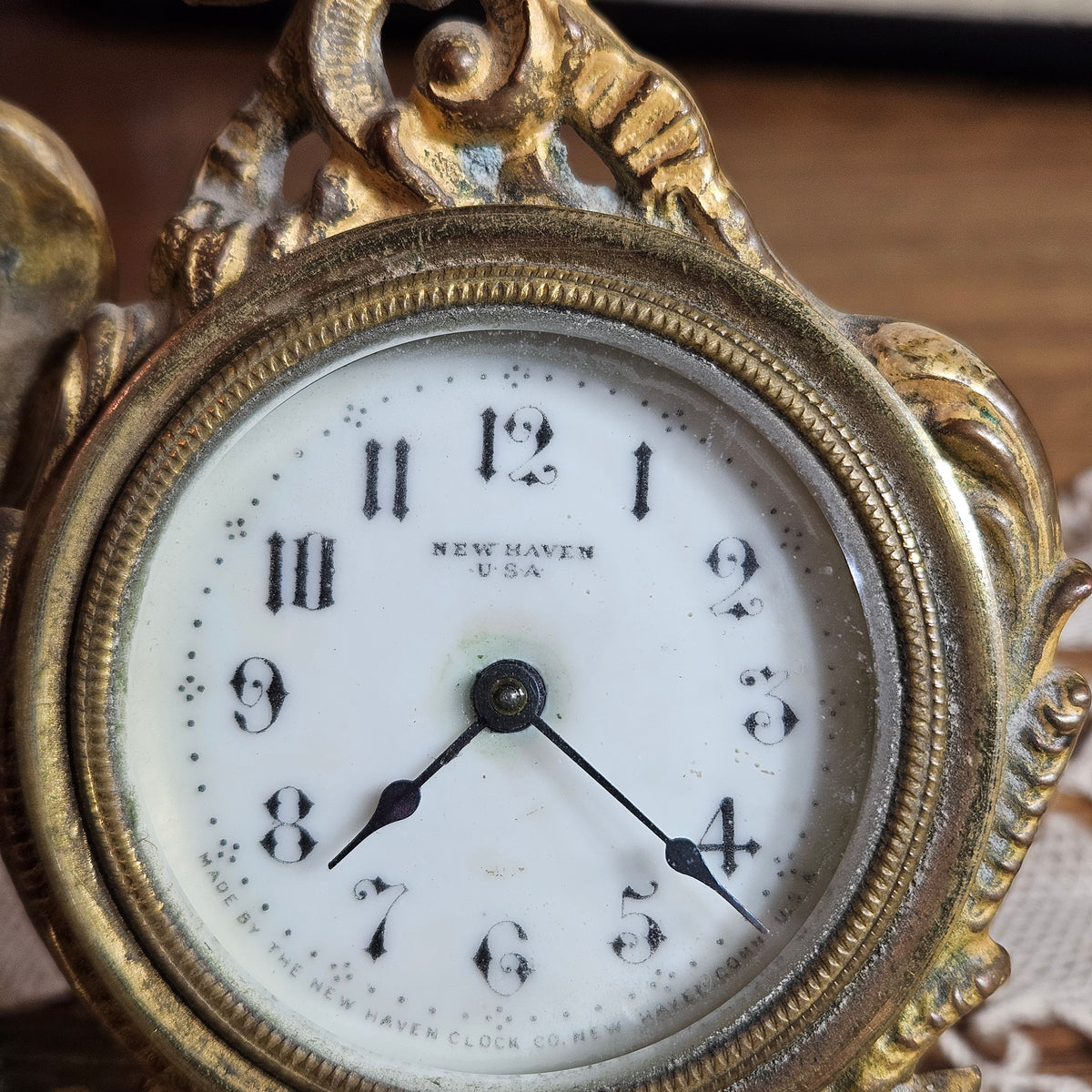 New Haven Cherub Figural Mantel Clock