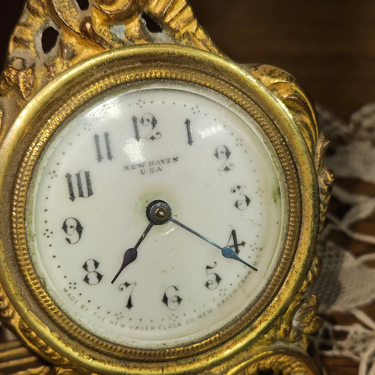 New Haven Cherub Figural Mantel Clock