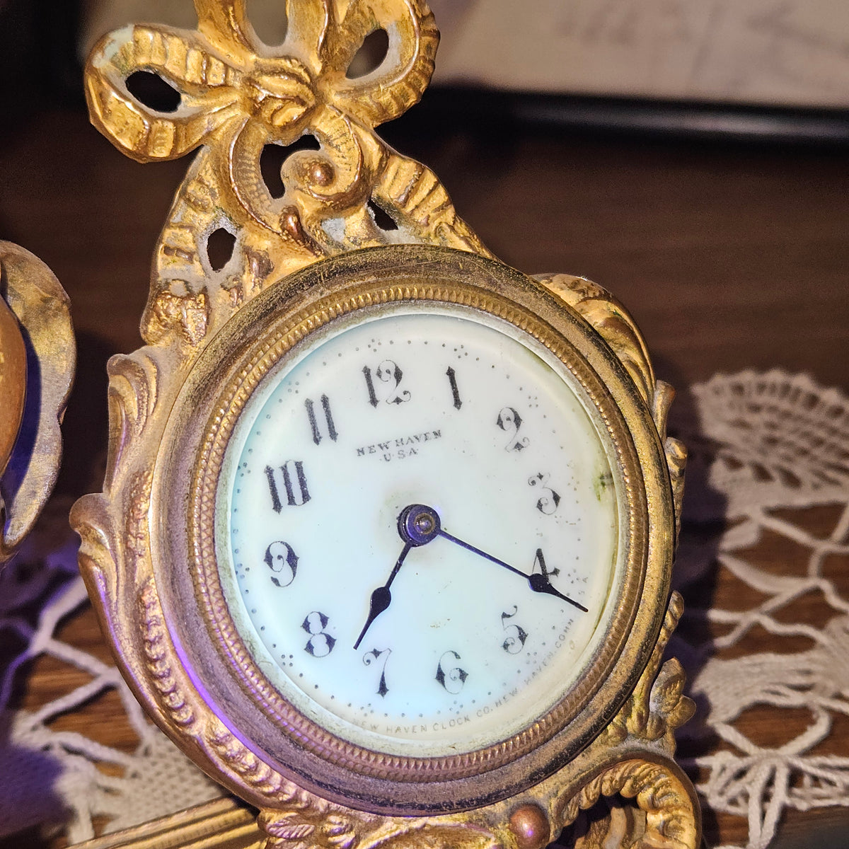 New Haven Cherub Figural Mantel Clock