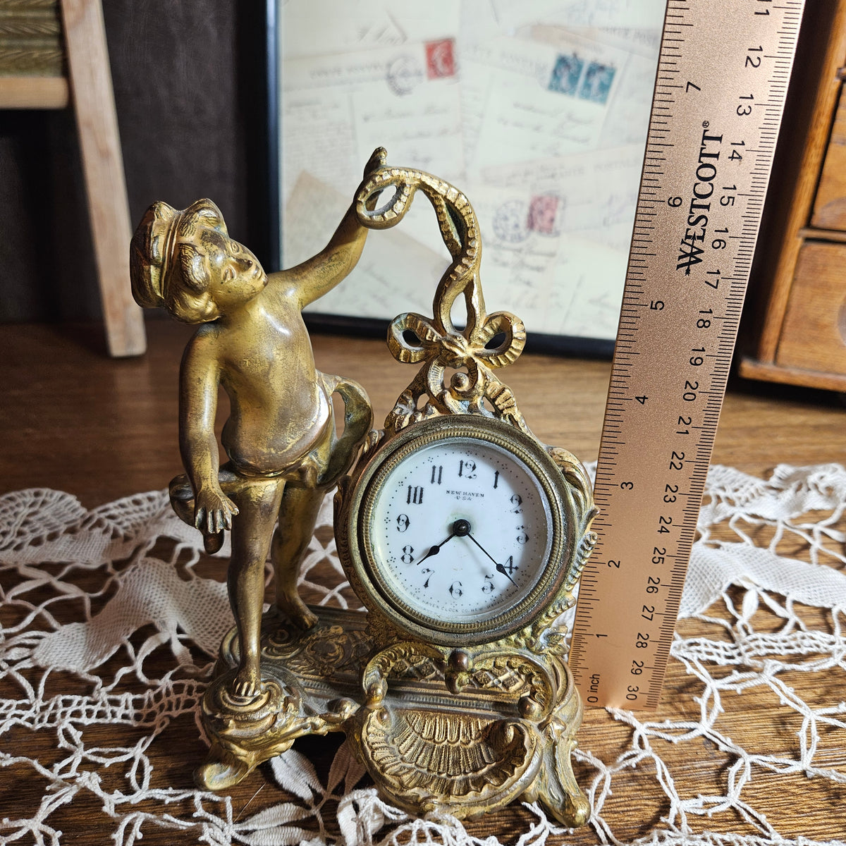 New Haven Cherub Figural Mantel Clock
