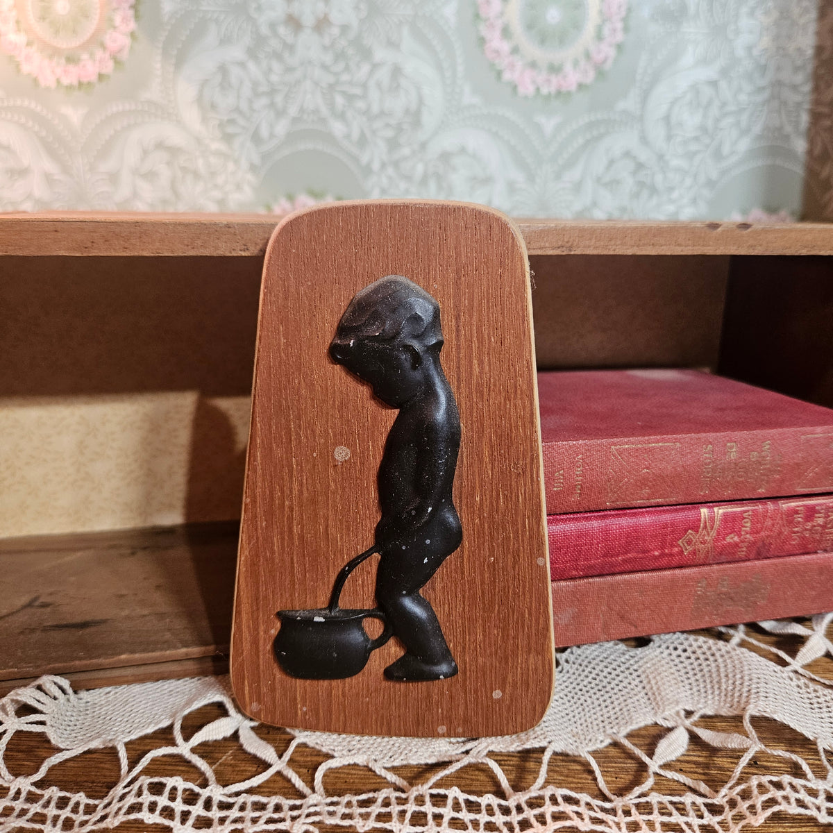 Wood Plaque with Black Figural Boy & Kettle