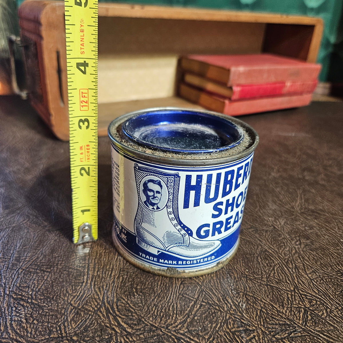 Hubert’s Shoe Grease Advertising Tin with Blue Glass Insert