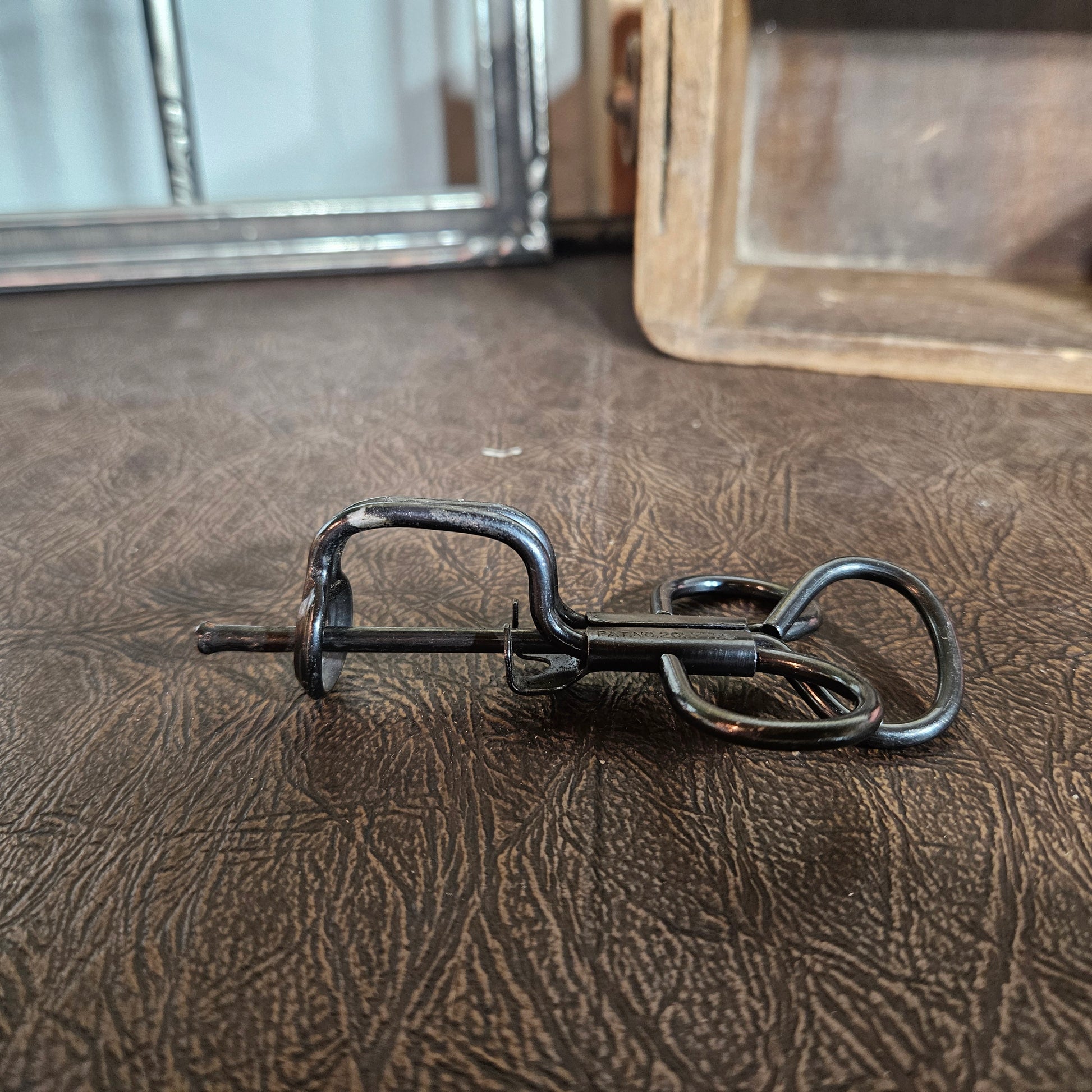 Antique metal fruit pitter for cherries and small fruit