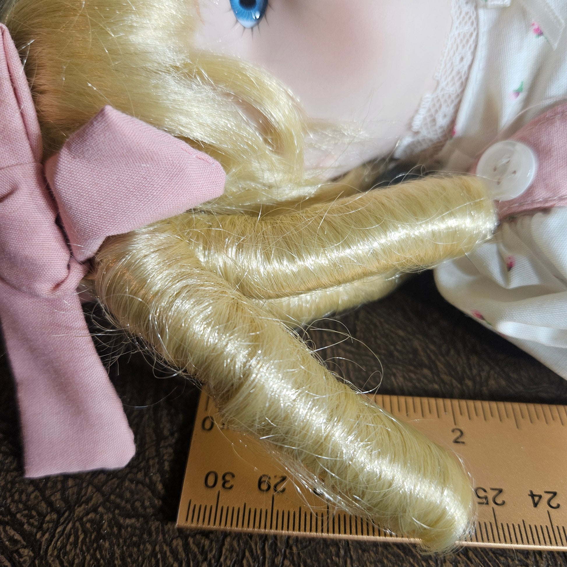 Gerri blonde vintage doll in pink outfit
