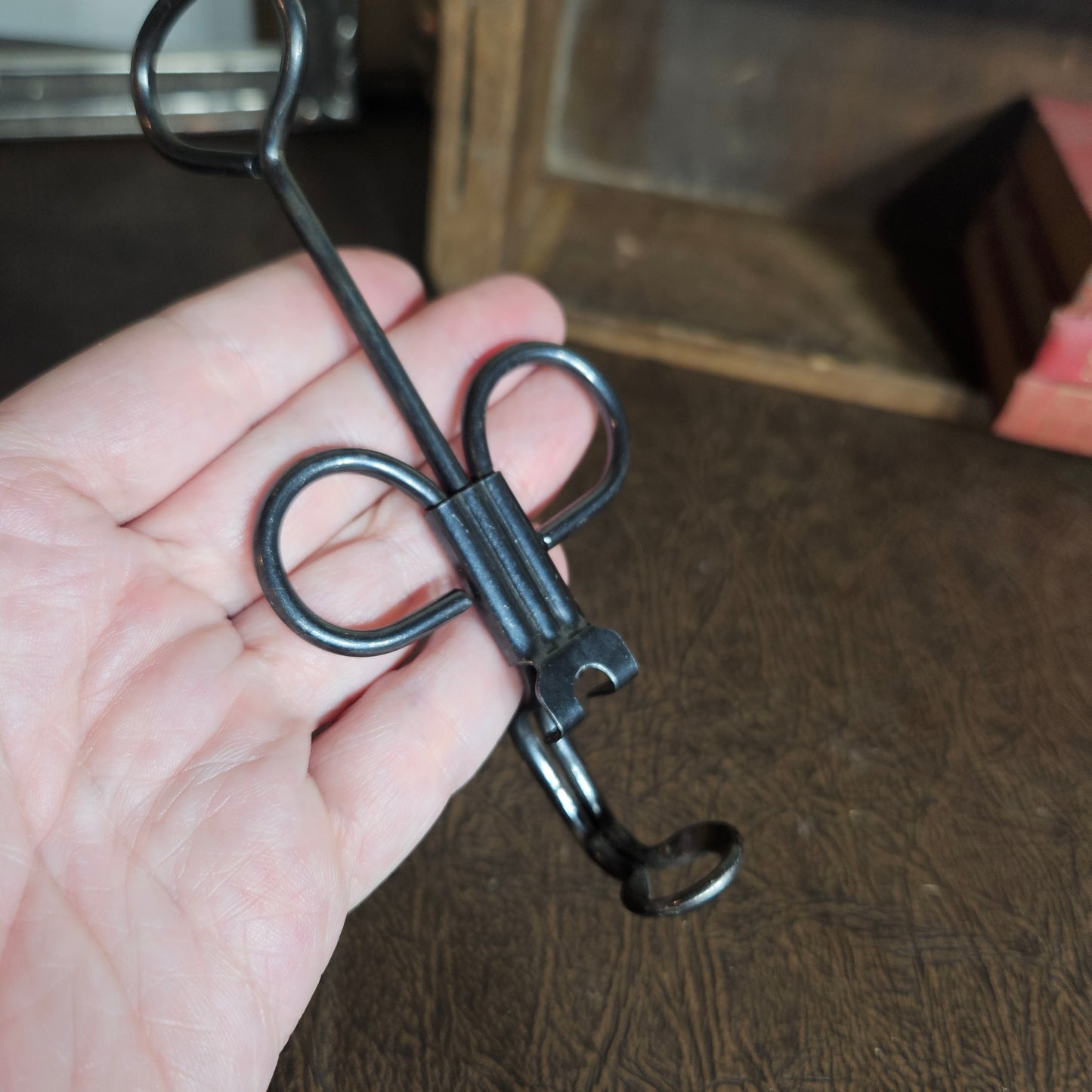 Farmhouse style cherry pitter with aged metal surface