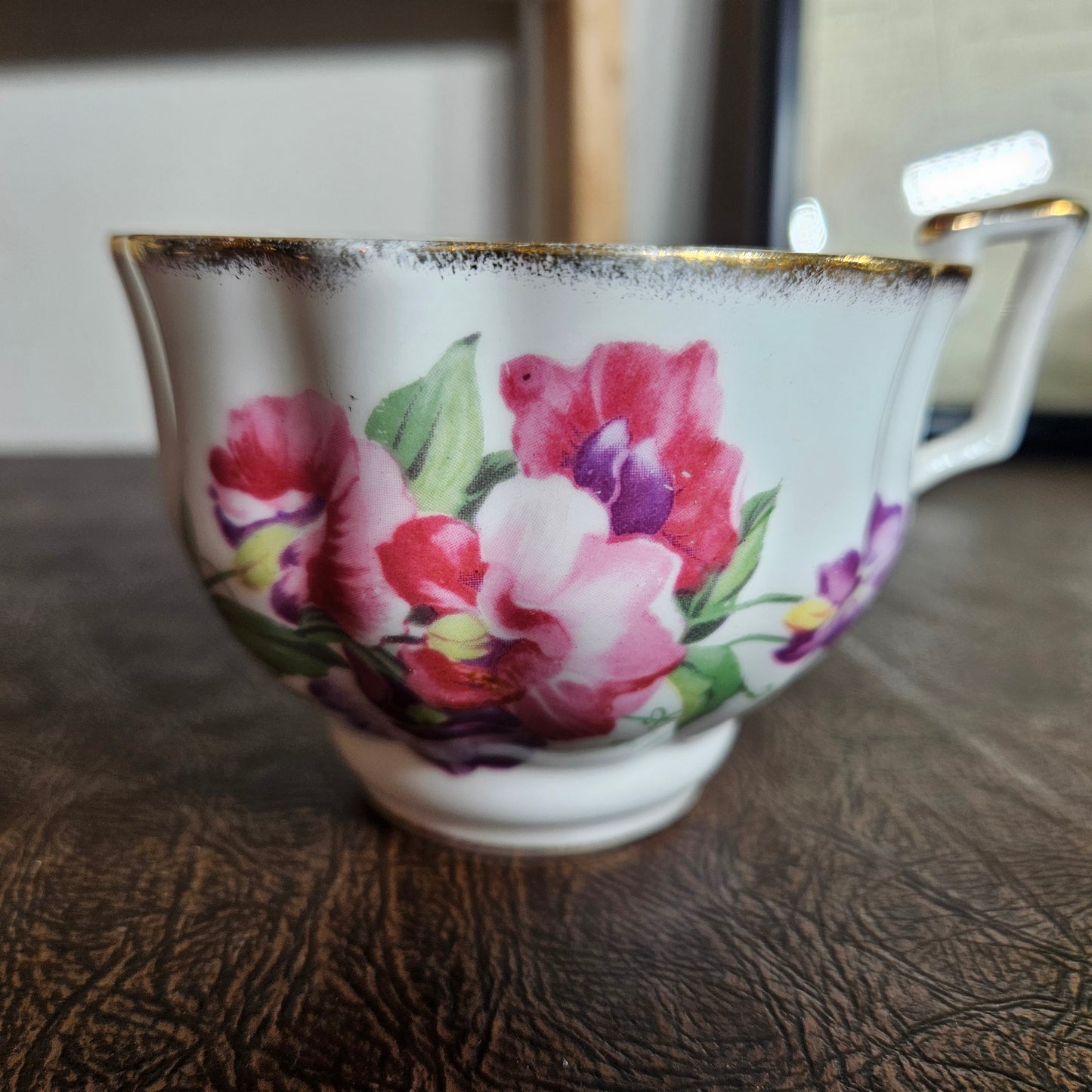 Foley bone china floral teacup with gold trim close up detail