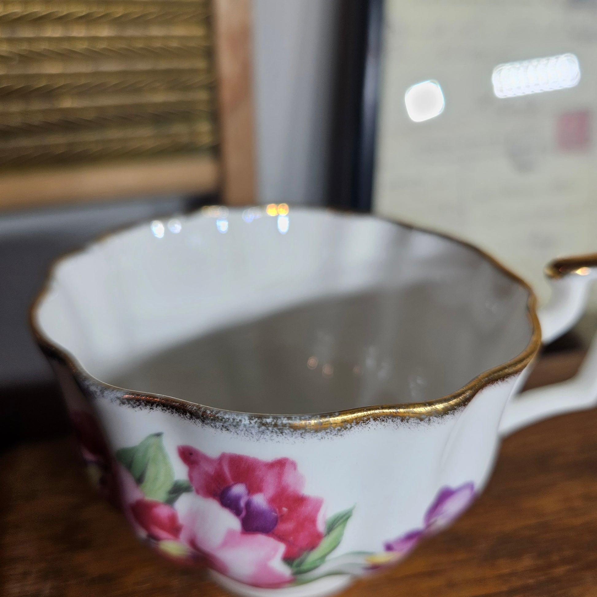 Foley bone china floral teacup with gold trim front view