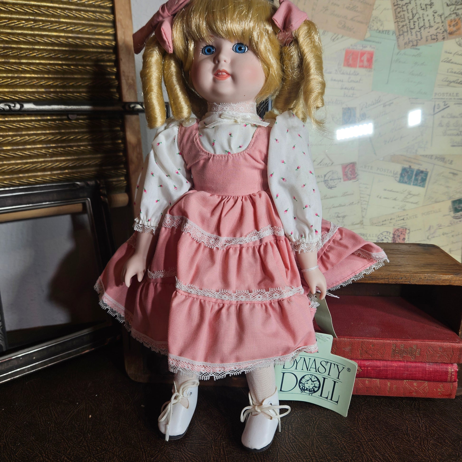 Gerri doll in layered pink dress with lace trim
