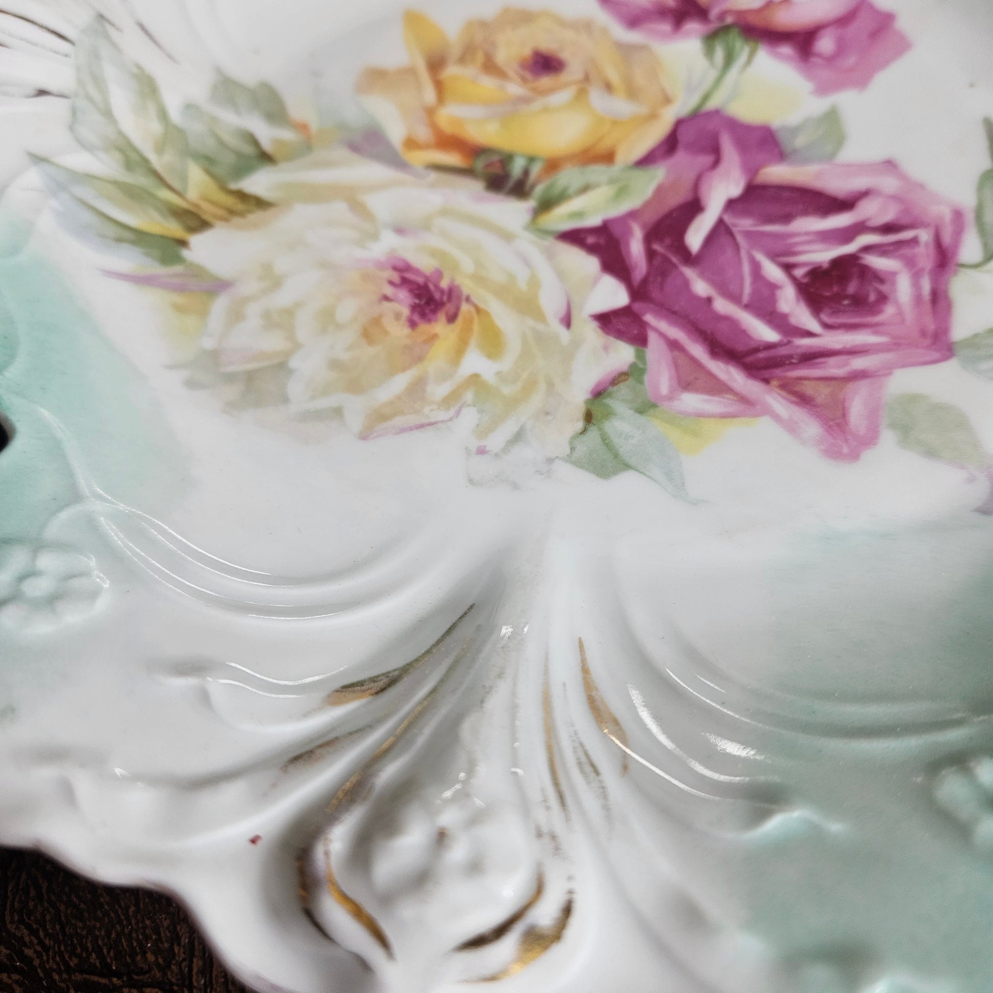 Vintage porcelain serving bowl green rim floral roses close up detail