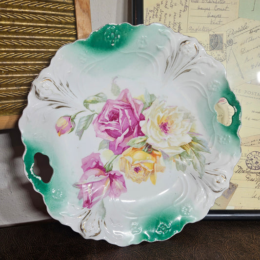 Vintage porcelain serving bowl green rim floral roses front view