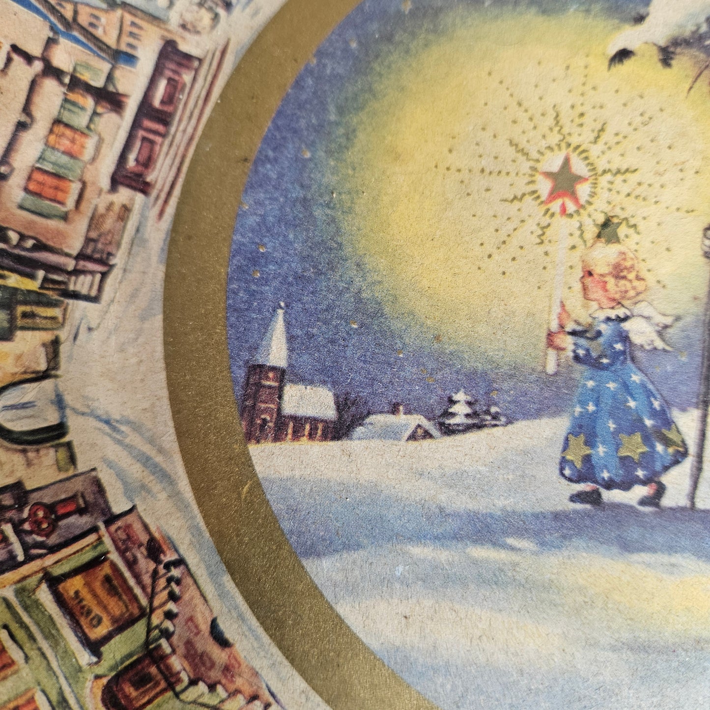 Holiday serving tray with snowy village artwork around border