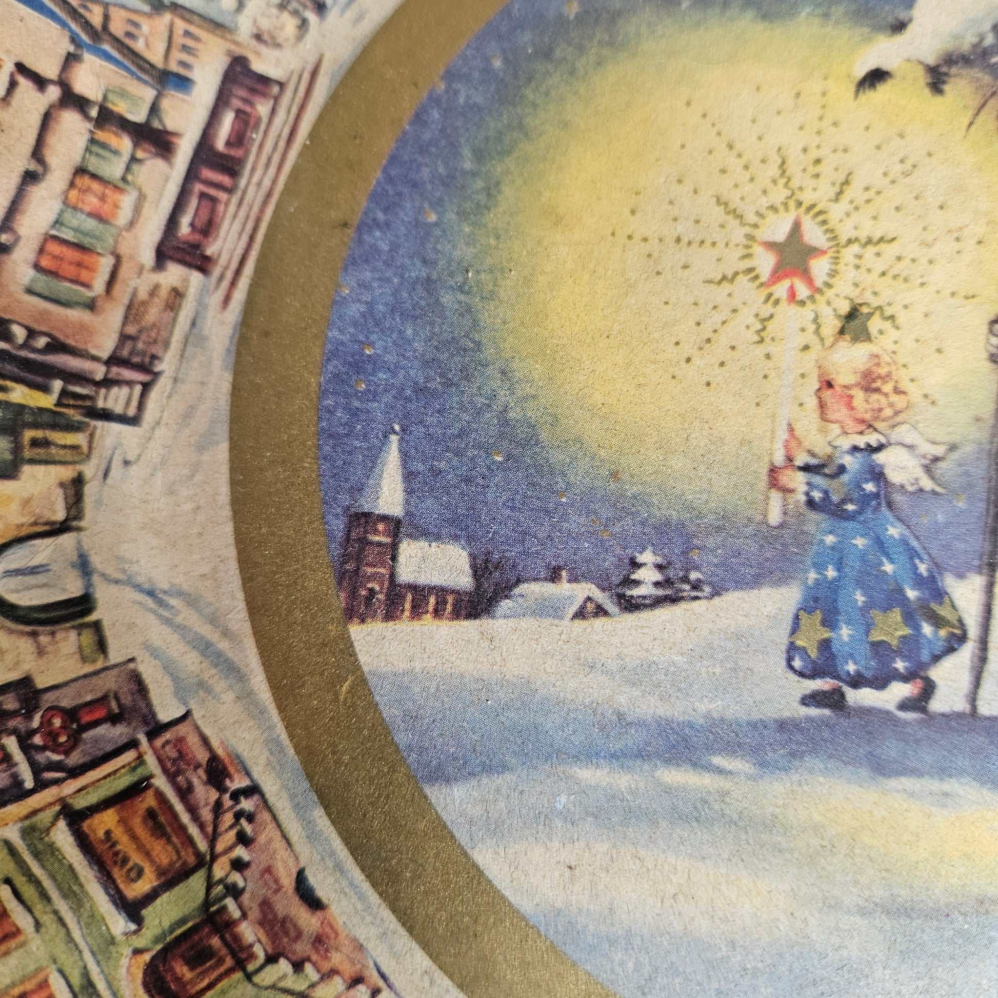 Holiday serving tray with snowy village artwork around border