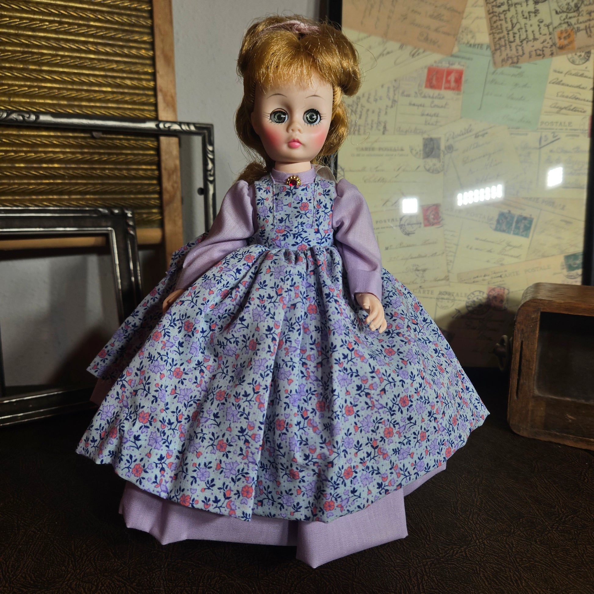 Madame Alexander Meg doll in purple floral dress
