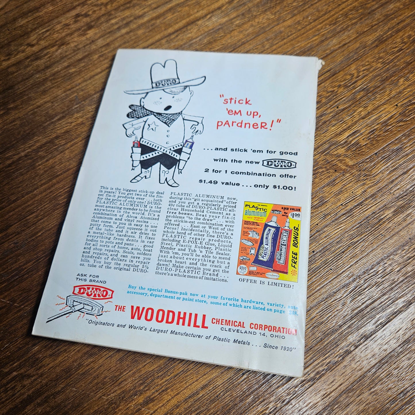 Vintage advertisement for Woodhill Chemical Corporation on a wooden surface