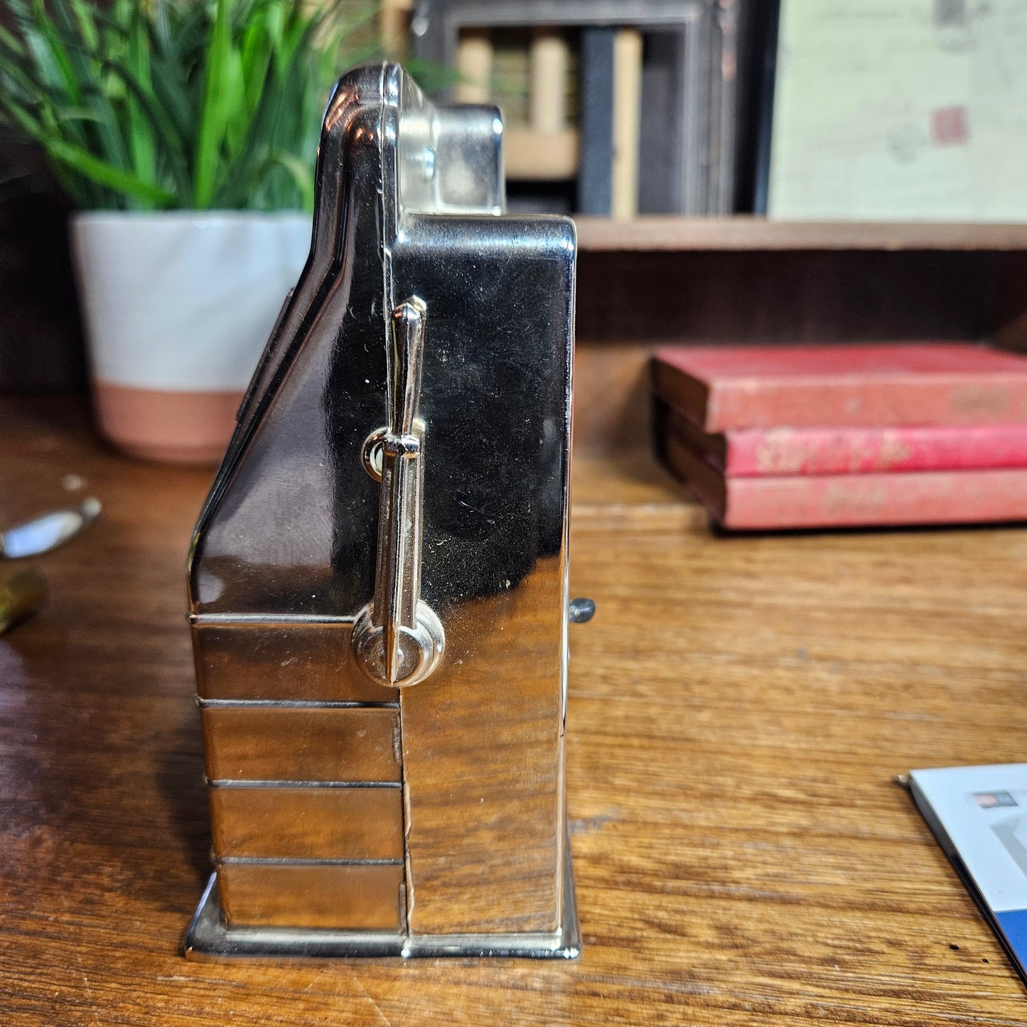 Retro slot machine style coin bank with lever and reels