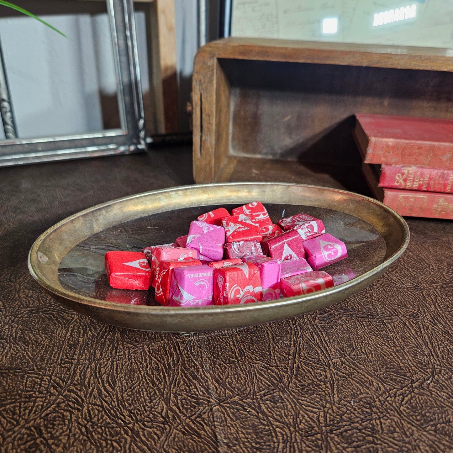 Retro entertaining dish with metal edge and clear glass