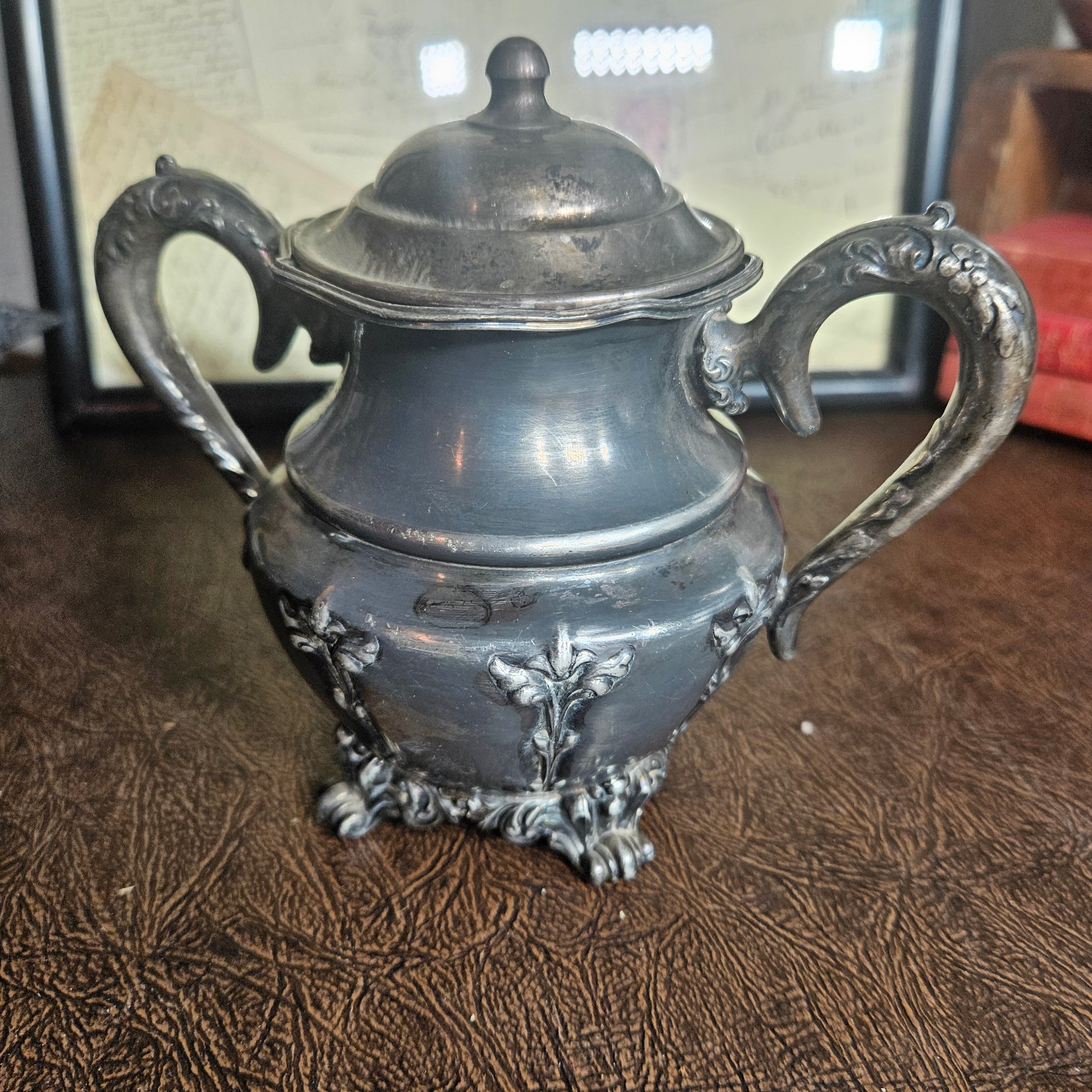 Vintage silverplate creamer and sugar bowl ornate set front view