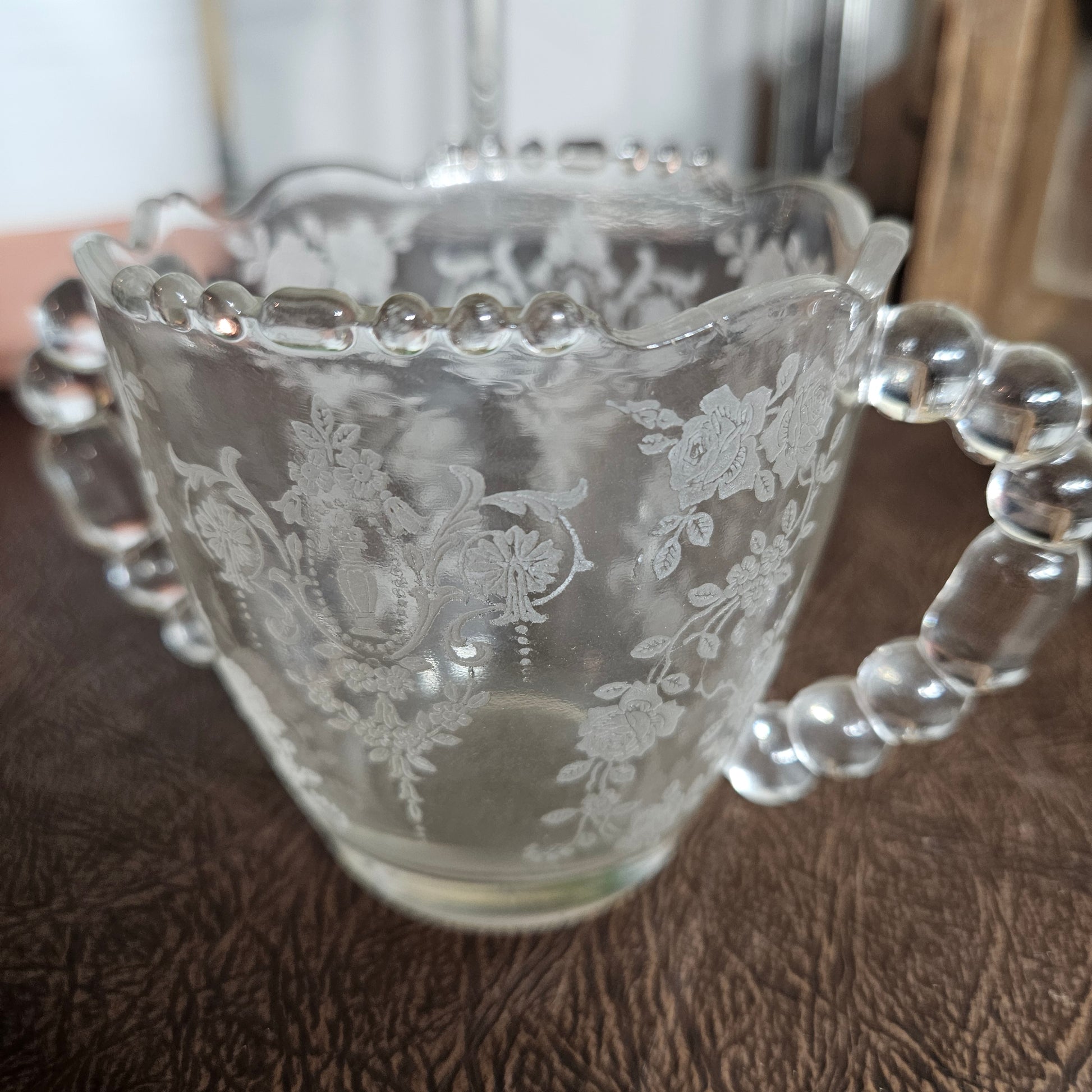 Vintage glass sugar bowl with floral etched pattern
