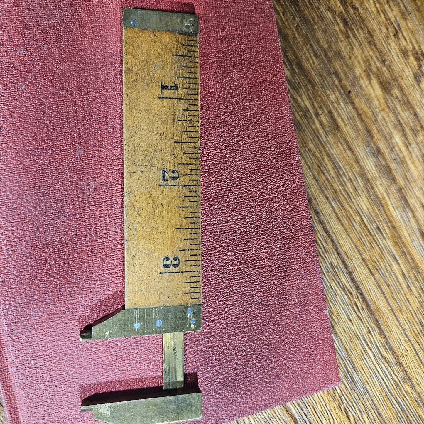 vintage wooden measuring caliper tool close up