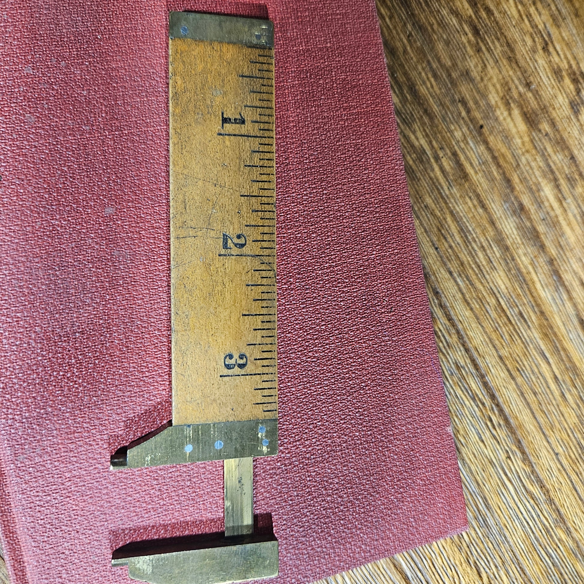 vintage wooden measuring caliper tool close up